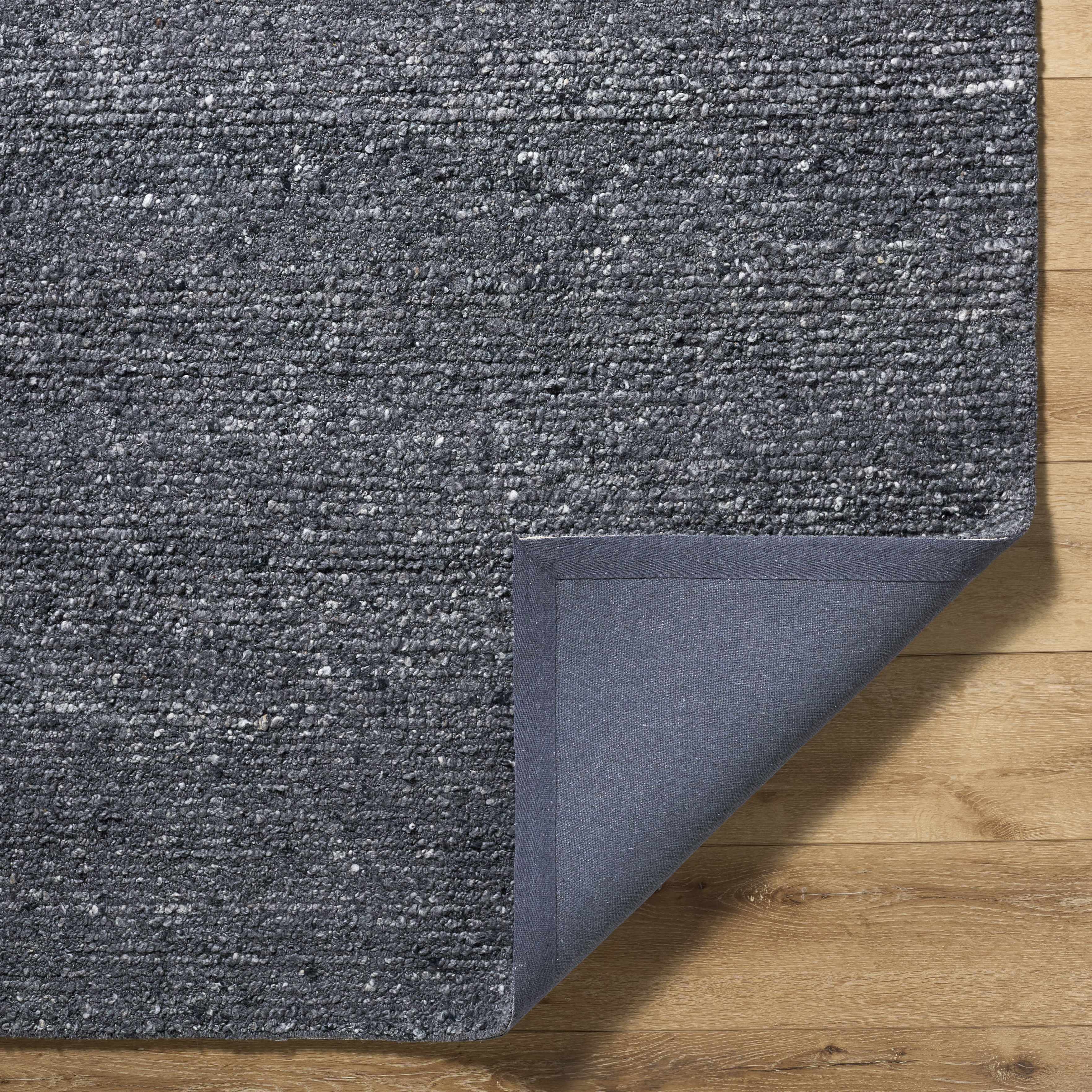 Winta Black Wool Area Rug - Bibenanova